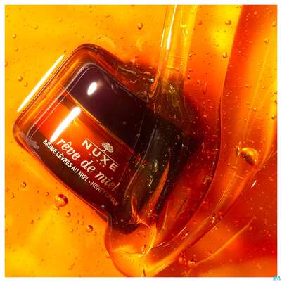 Sie sehen eine Packung Nuxe Reve De Miel Baume Levres 15g, Produktbild: 12 Nuxe Reve De Miel Baume Levres 15g, A-Nr.: 4080378 - 12